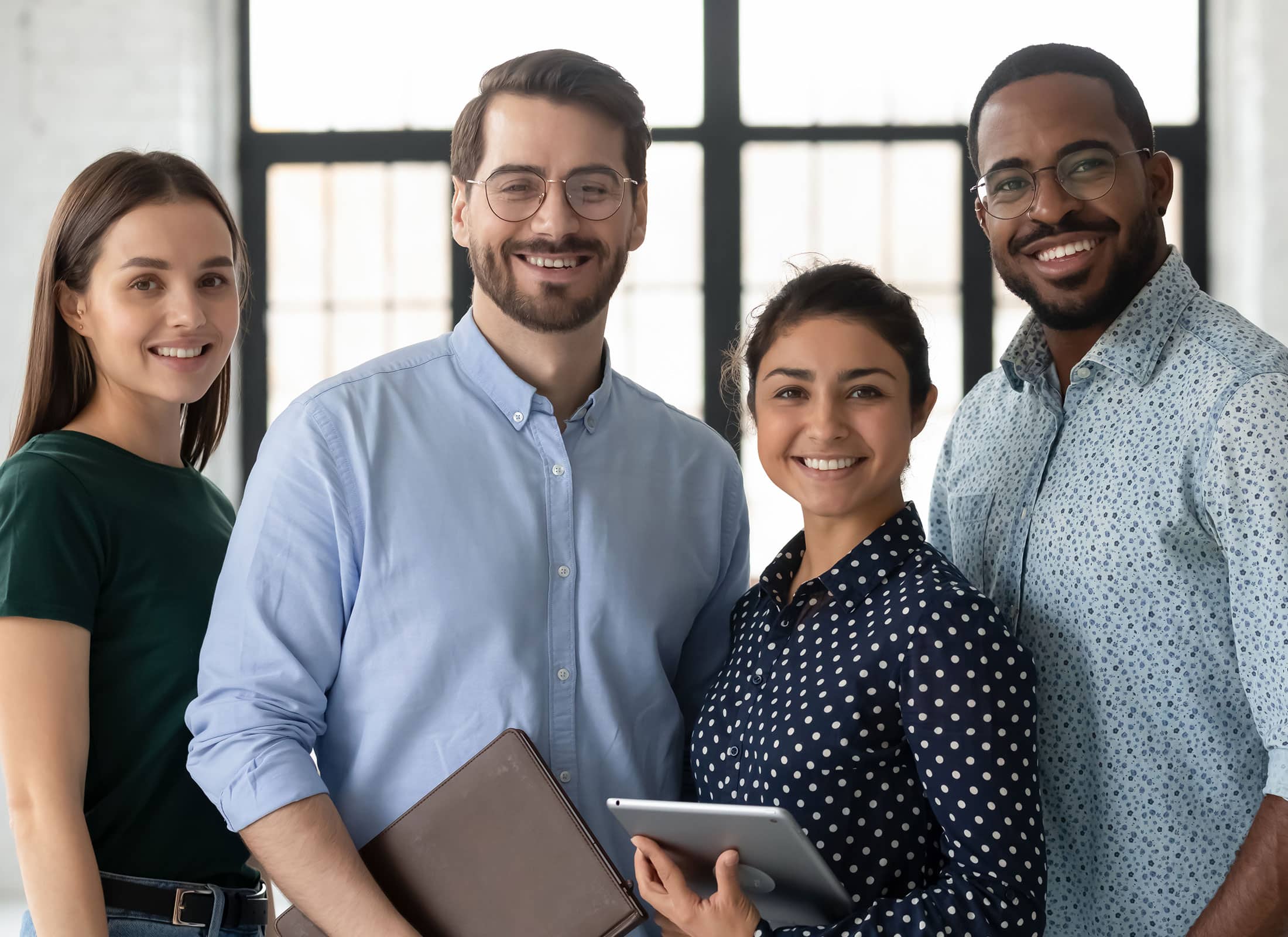 Professional specialists posing at office